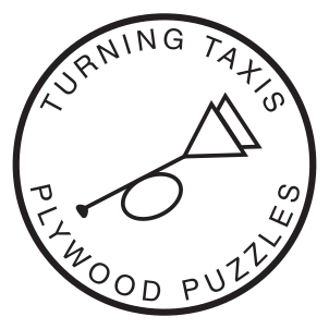 Turning Taxis Handcut Puzzles logo